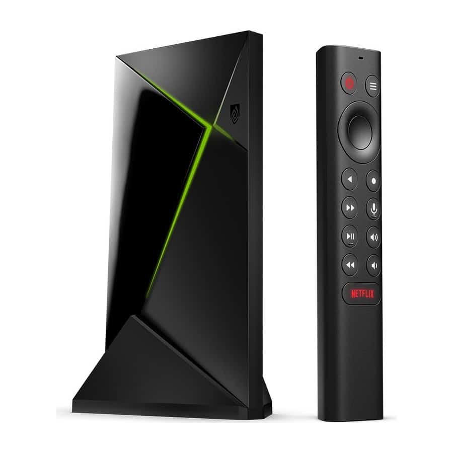 Nvidia Shield TV Pro streaming box standing next to its backlit remote